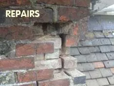 Repairs: a damaged brick chimney stack with missing mortar