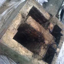 Top of a chimney stack opened up to show the flues during restoration